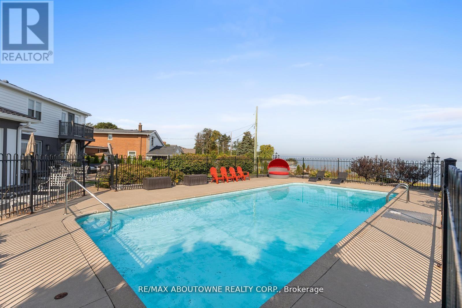 1073 North Service Road, Hamilton, ON - Outdoor With In Ground Pool With Backyard