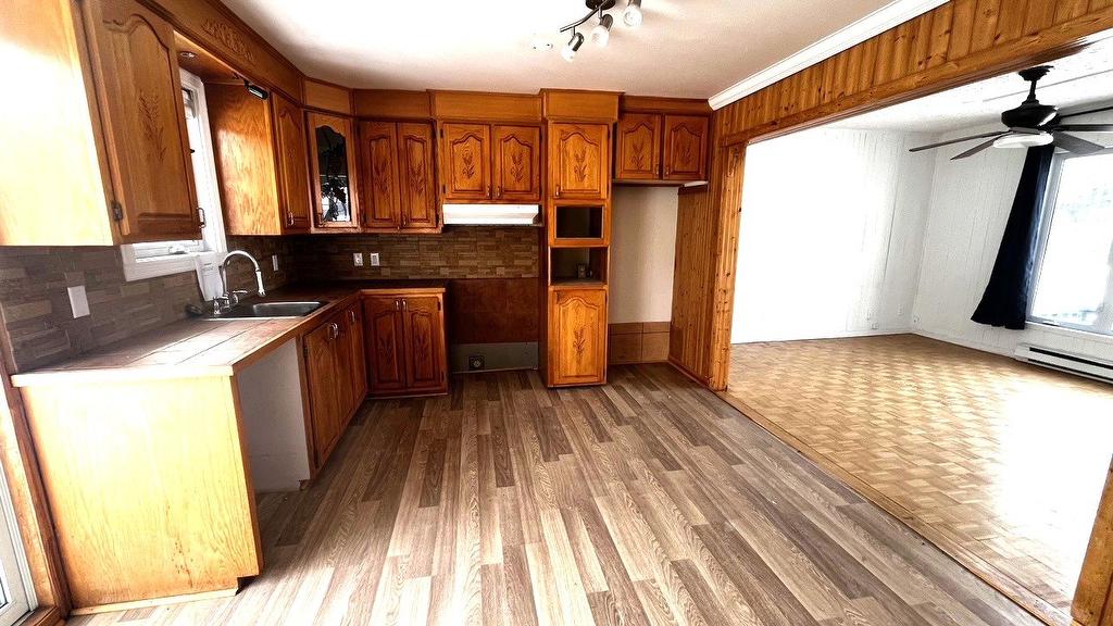 Cuisine - 8830 Av. Gravel, Laval (Saint-François), QC - Indoor Photo Showing Other Room