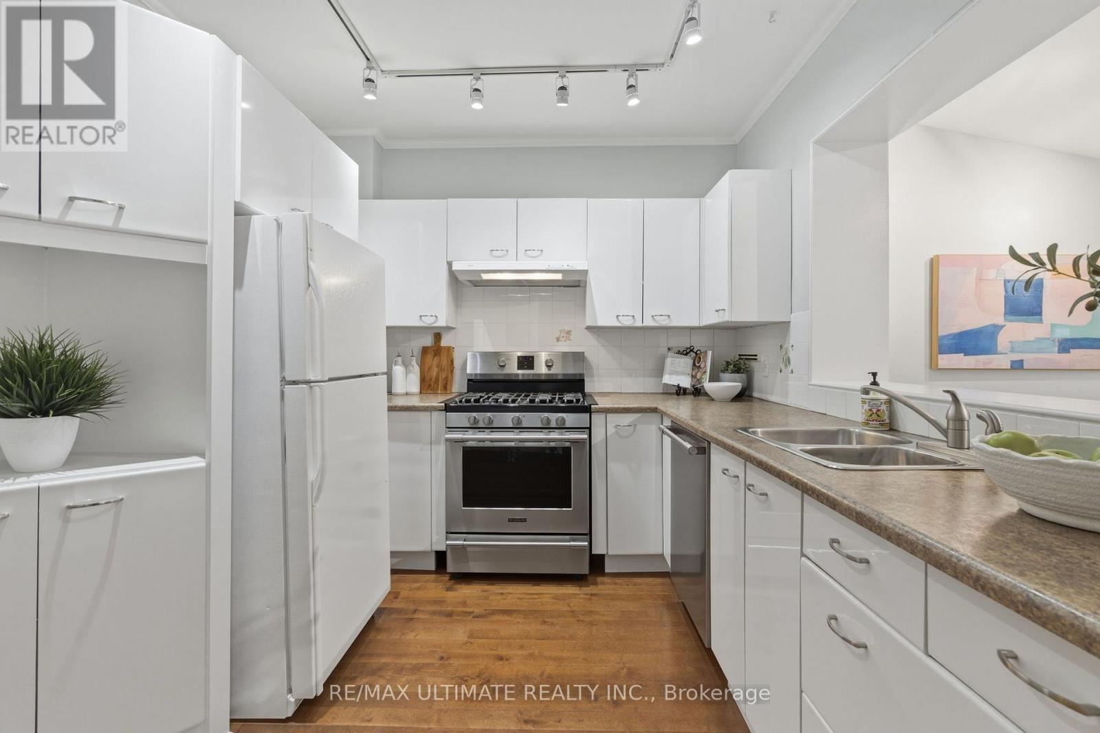 27 Osborne Avenue, Toronto, ON - Indoor Photo Showing Kitchen With Double Sink