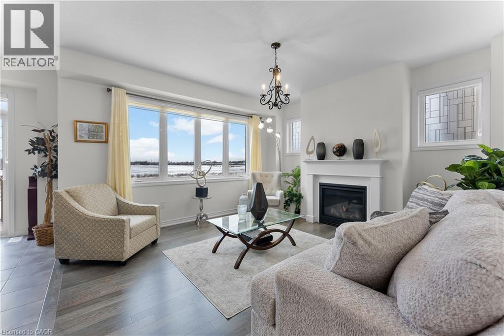 229 Vanilla Trail, Thorold, ON - Indoor Photo Showing Living Room With Fireplace