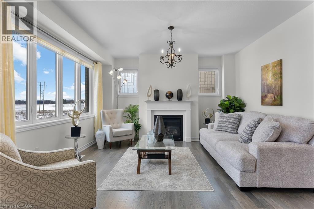 229 Vanilla Trail, Thorold, ON - Indoor Photo Showing Living Room With Fireplace