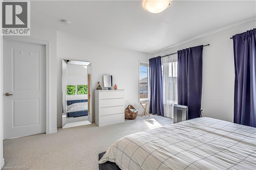 View of carpeted bedroom - 29 Bellhouse Avenue, Brantford, ON - Indoor Photo Showing Bedroom