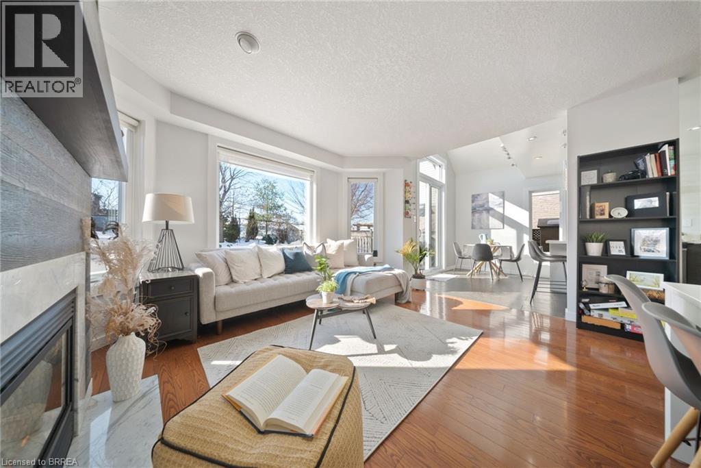 67 Wadsworth Crescent, Cambridge, ON - Indoor Photo Showing Living Room With Fireplace