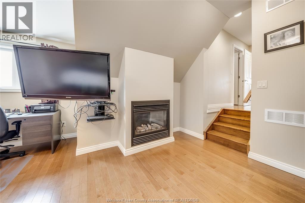 12337 Candlewood Drive, Tecumseh, ON - Indoor With Fireplace