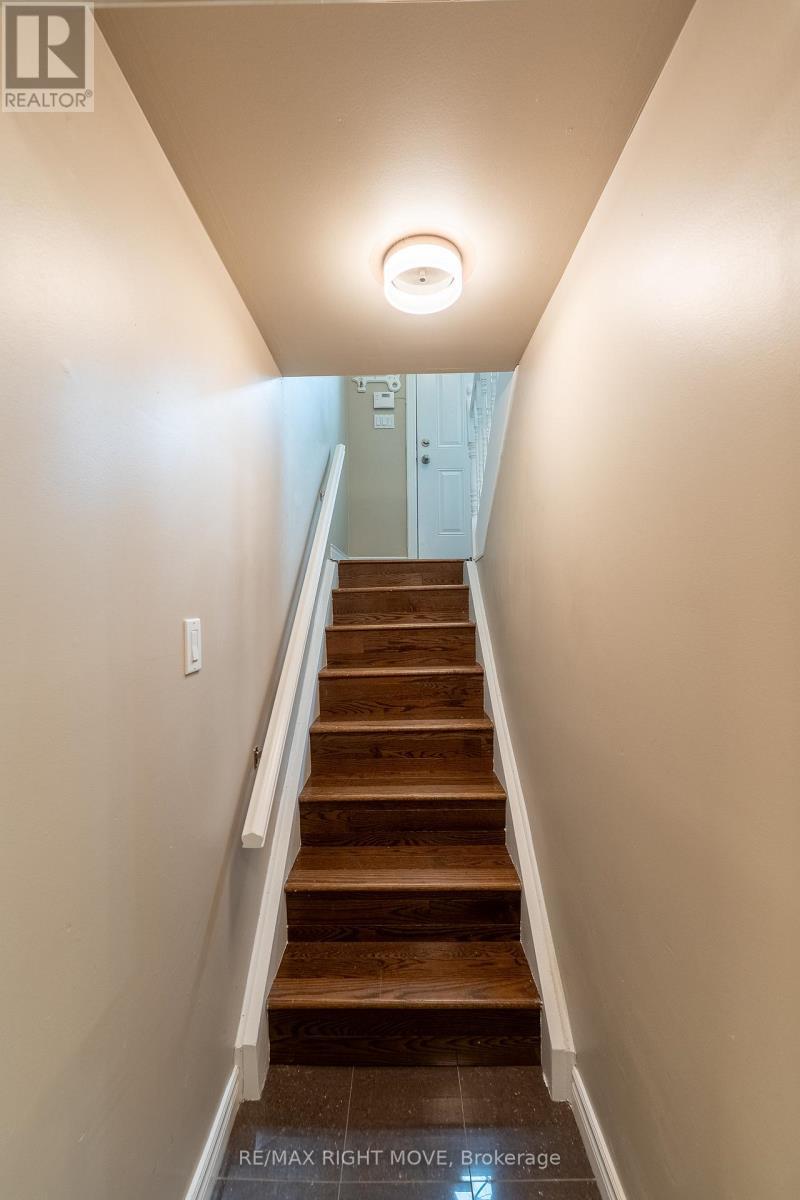Staircase to lower level - 3304 Goldstein Road, Severn, ON - Indoor Photo Showing Other Room