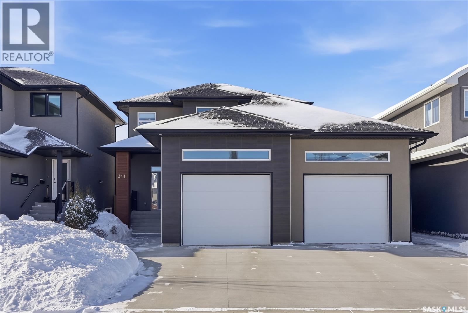 311 Mahabir Court, Saskatoon, SK - Outdoor With Facade