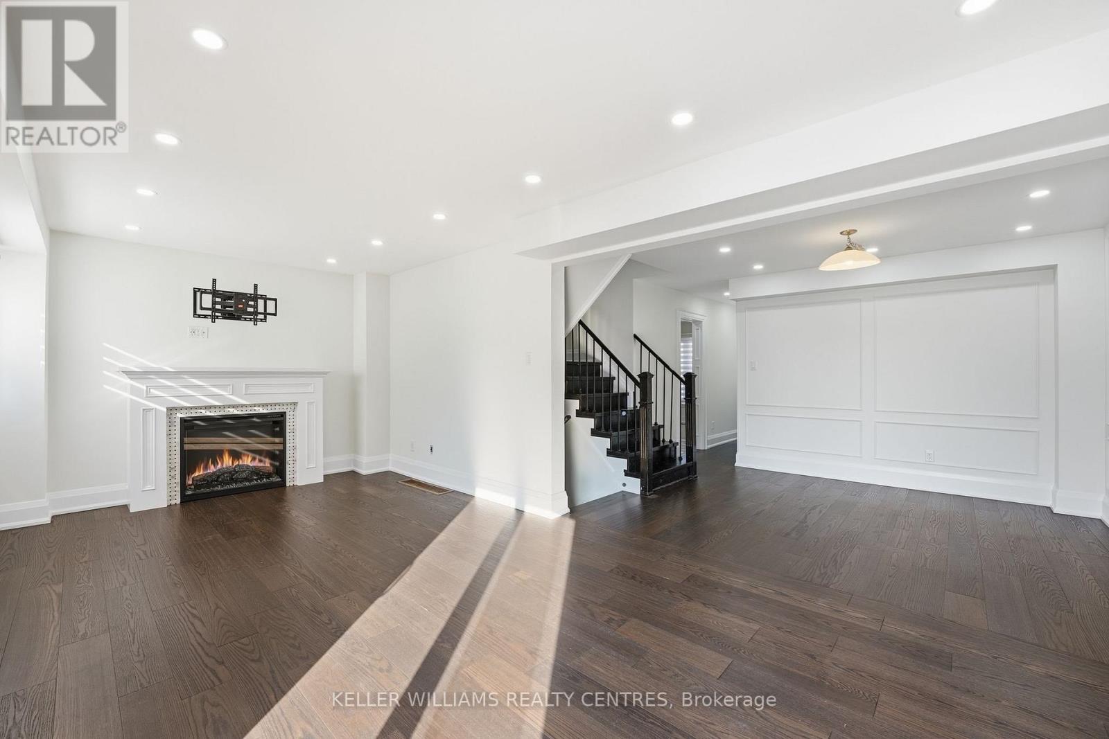 16 Stalbridge Avenue, Brampton, ON - Indoor Photo Showing Living Room With Fireplace