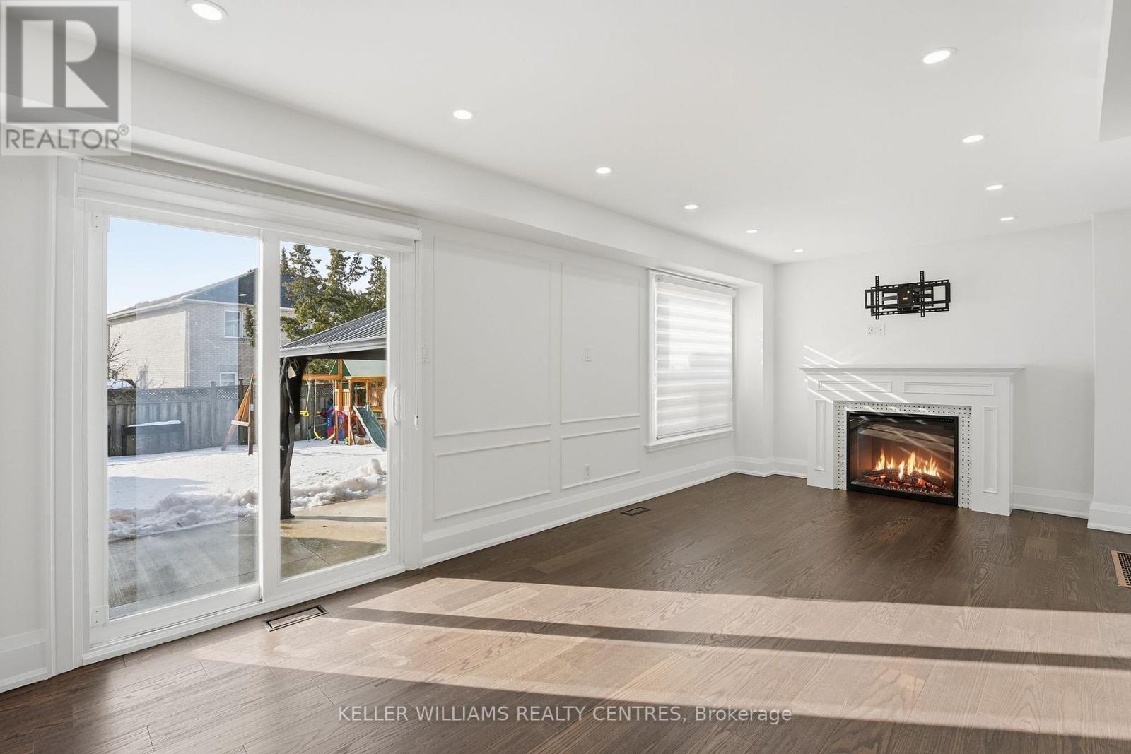 16 Stalbridge Avenue, Brampton, ON - Indoor Photo Showing Other Room With Fireplace