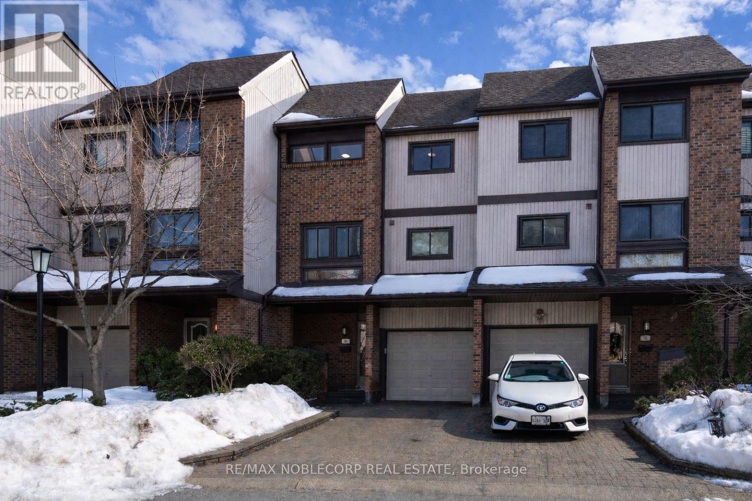 52 - 1080 Walden Circle, Mississauga, ON - Outdoor With Facade