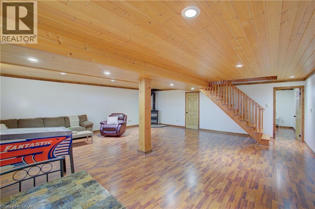 Fully finished basement with wood stove and ample room for home theatre, play room, gym and more - 802080 Grey Road 40, Chatsworth (Twp), ON - Indoor