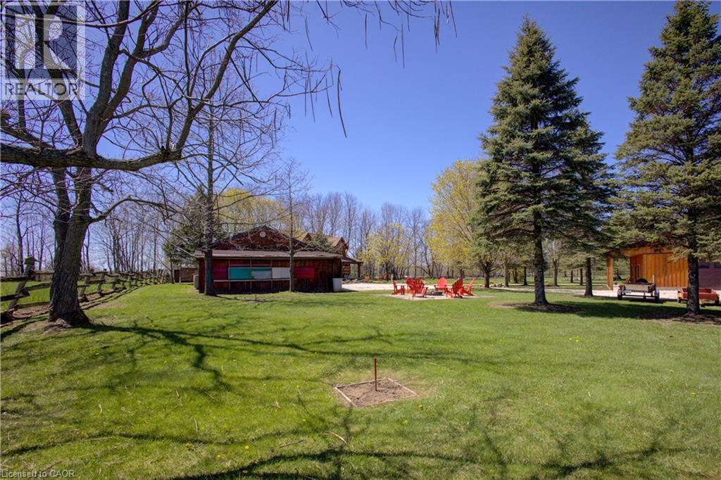 Play horseshoe or cozy up next to a fire. - 802080 Grey Road 40, Chatsworth (Twp), ON - Outdoor