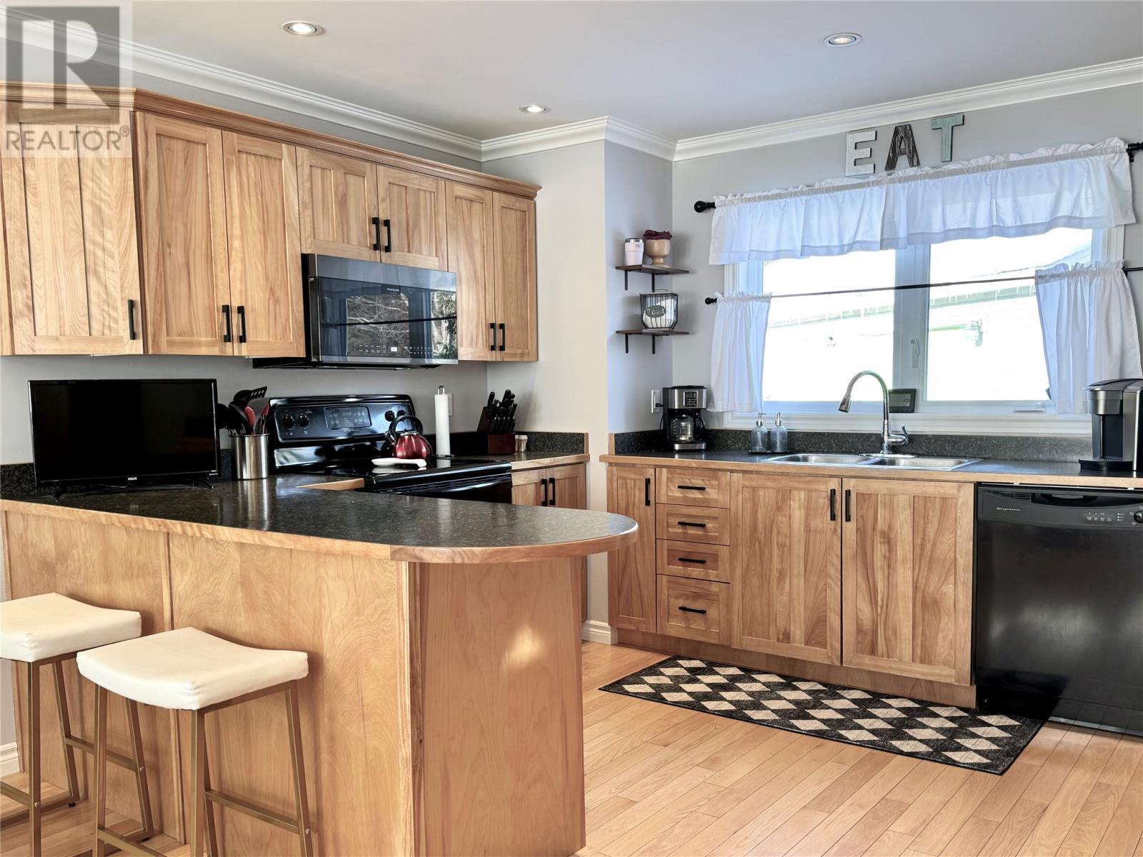 9 Brook Close, Humber Valley Resort, NL - Indoor Photo Showing Kitchen With Double Sink