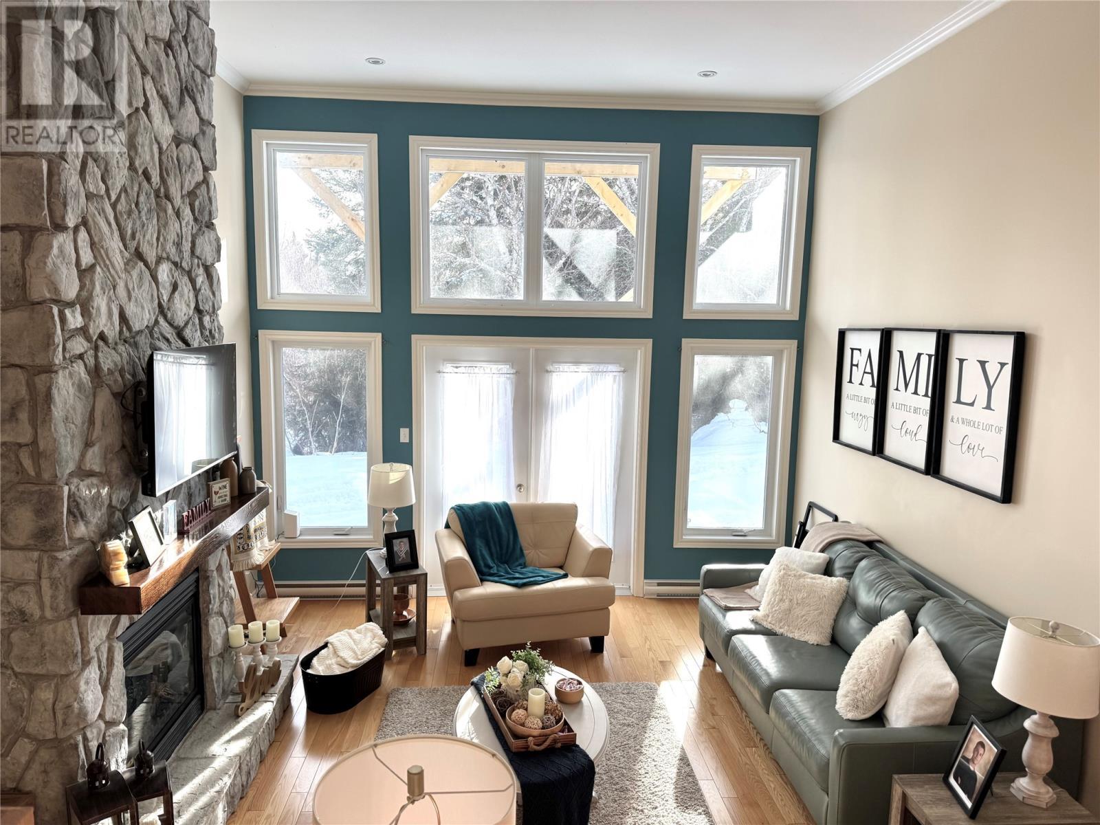 9 Brook Close, Humber Valley Resort, NL - Indoor Photo Showing Living Room With Fireplace
