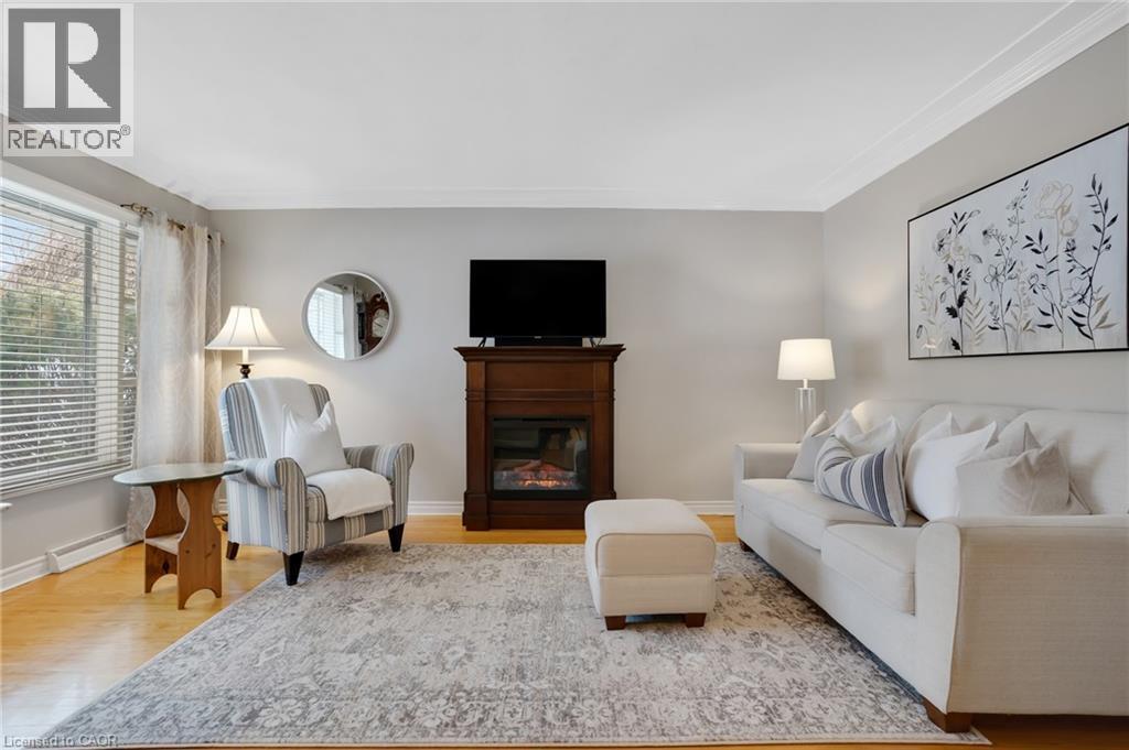 14 Hearth Crescent, Kitchener, ON - Indoor Photo Showing Living Room With Fireplace