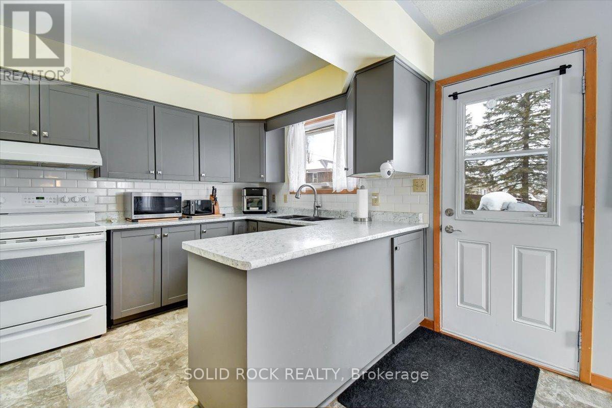 Walk Out to Deck & Yard - 111 Church Street, Trent Hills, ON - Indoor Photo Showing Kitchen