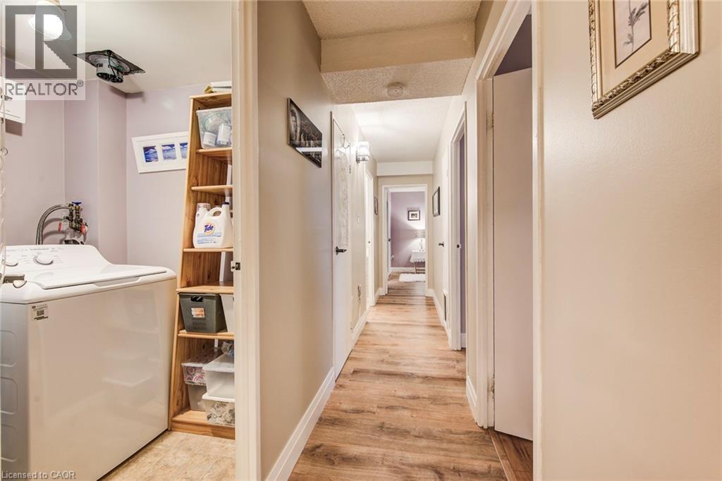 Corridor-Laundry Room - 93 Westwood Road Unit# 206, Guelph, ON - Indoor Photo Showing Laundry Room
