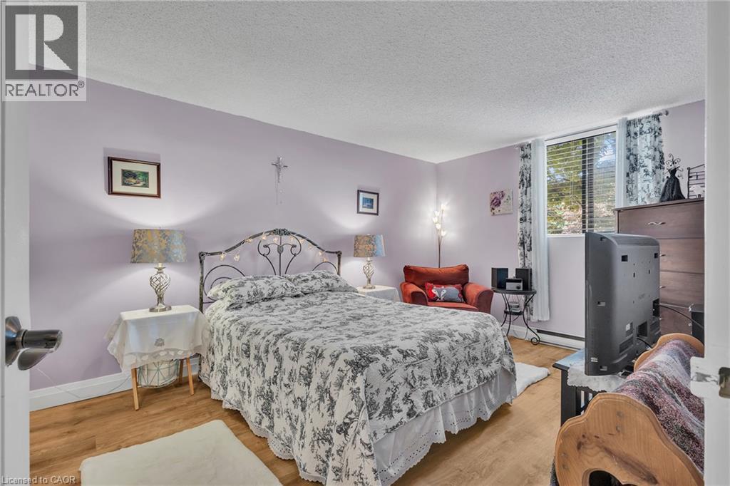 Primary Bedroom - 93 Westwood Road Unit# 206, Guelph, ON - Indoor Photo Showing Bedroom