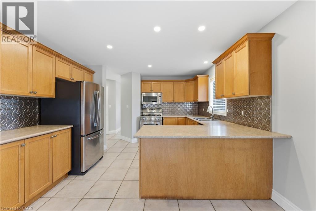 3 Holkham Avenue, Hamilton, ON - Indoor Photo Showing Kitchen With Double Sink