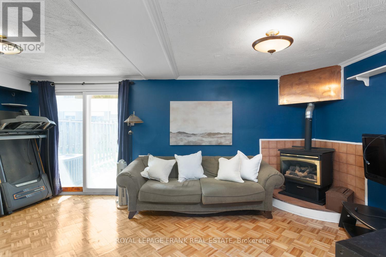 42 - 700 Harmony Road N, Oshawa (Pinecrest), ON - Indoor Photo Showing Other Room With Fireplace