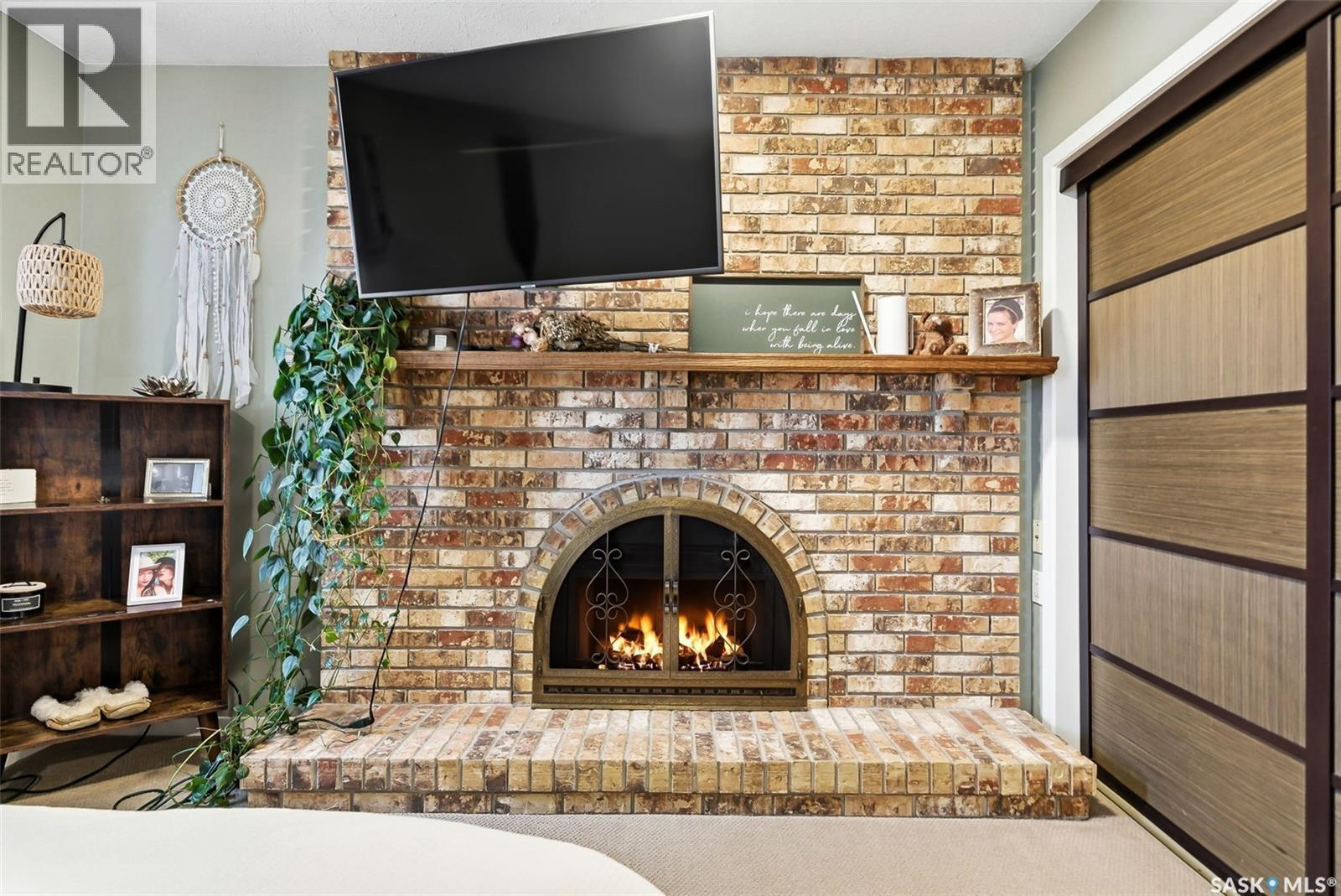 2402 Truesdale Drive, Regina, SK - Indoor Photo Showing Living Room With Fireplace