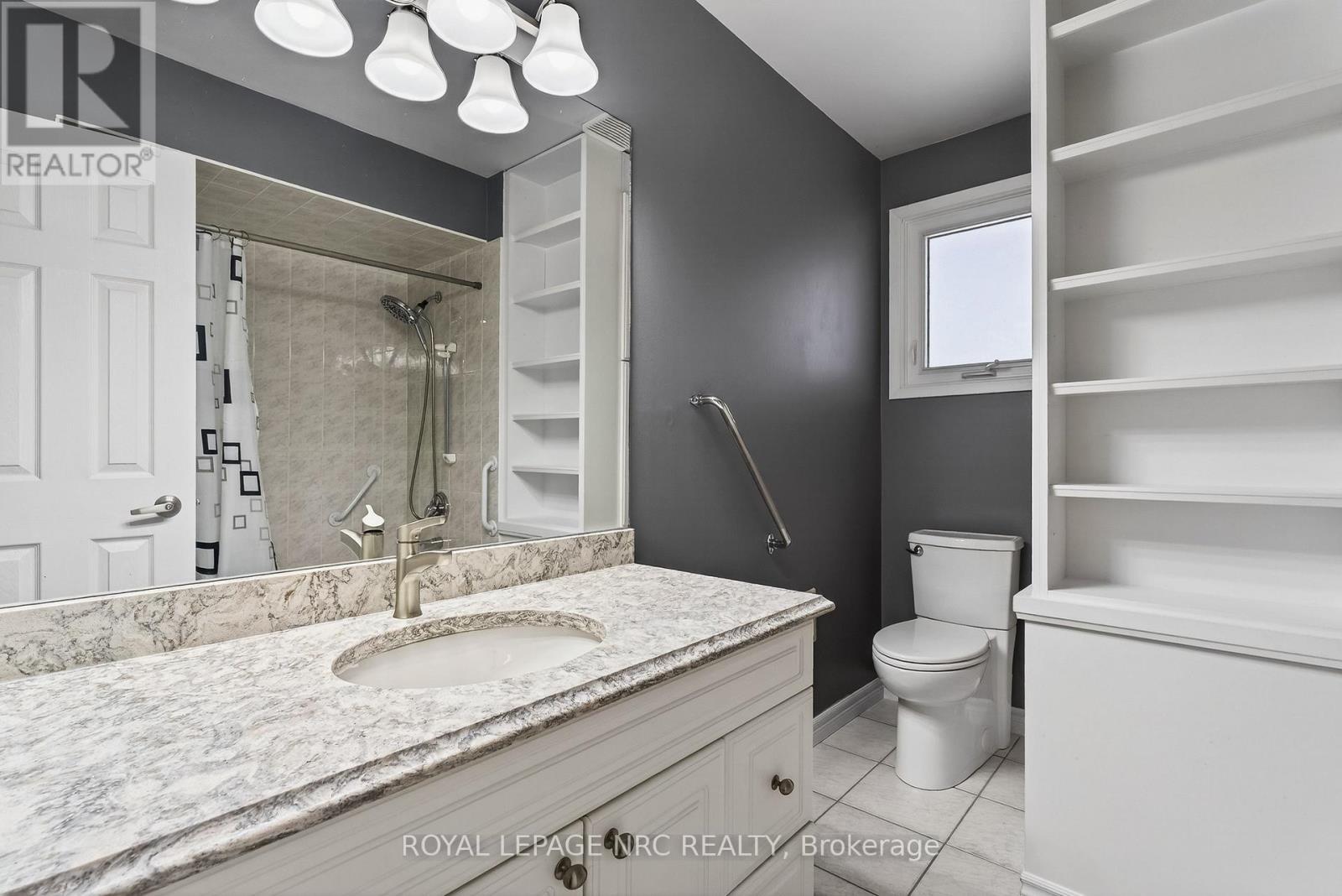 Lots of shelf storage plus Linen closet - 3292 Appleford Avenue, Niagara Falls (Casey), ON - Indoor Photo Showing Bathroom