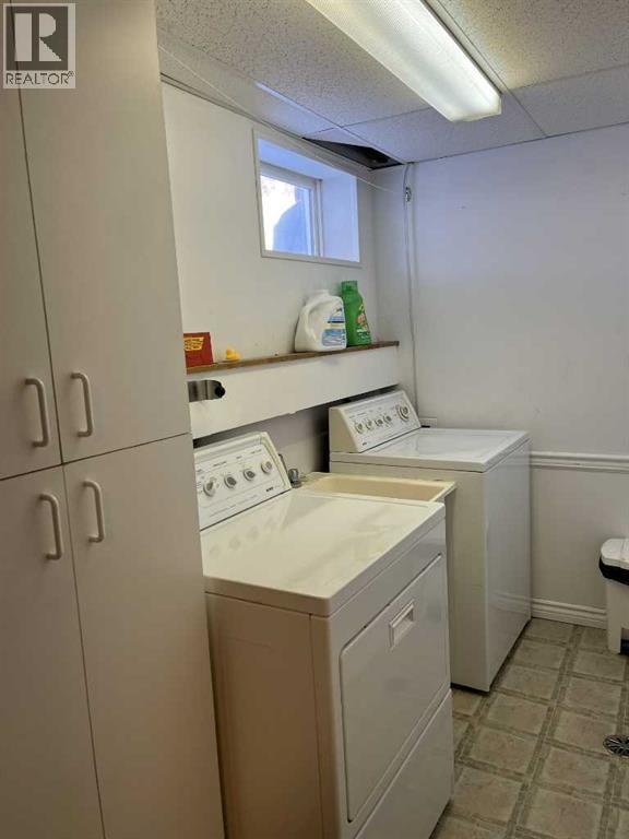 Laundry room - 4617 51 Avenue, Taber, AB - Indoor Photo Showing Laundry Room