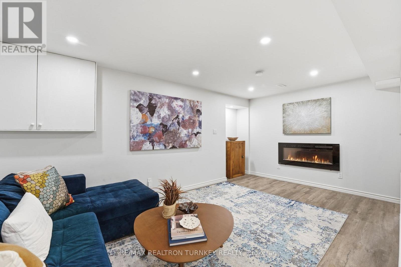 Fully finished lower level - 196 Orchard Heights Boulevard, Aurora, ON - Indoor Photo Showing Living Room With Fireplace