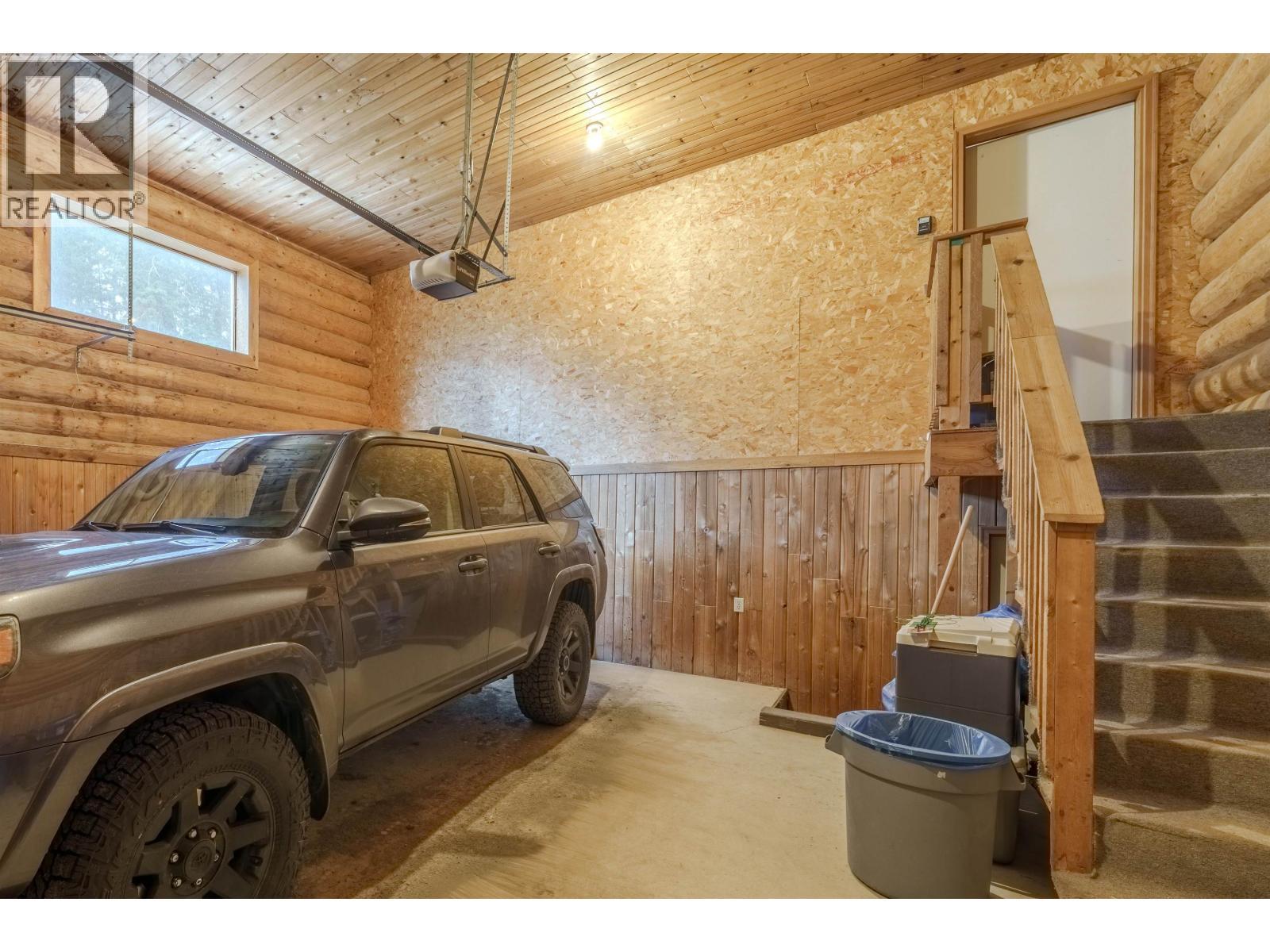 5172 Kallum Drive, 108 Mile Ranch, BC - Indoor Photo Showing Garage
