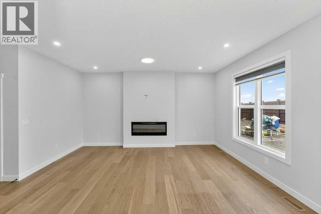 268 Cornerbrook Road Ne, Calgary, AB - Indoor With Fireplace