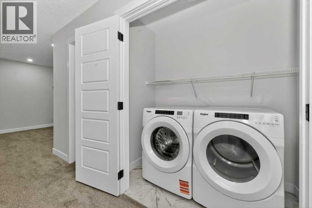 268 Cornerbrook Road Ne, Calgary, AB - Indoor Photo Showing Laundry Room