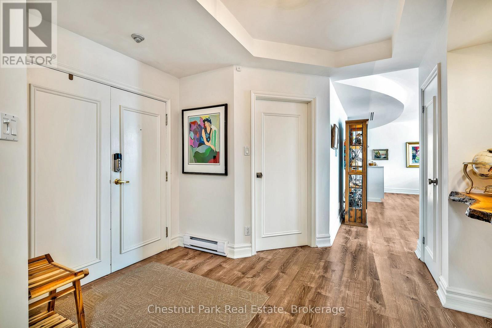 Welcoming front foyer - 1001 - 24 Ramblings Way, Collingwood, ON - Indoor Photo Showing Other Room