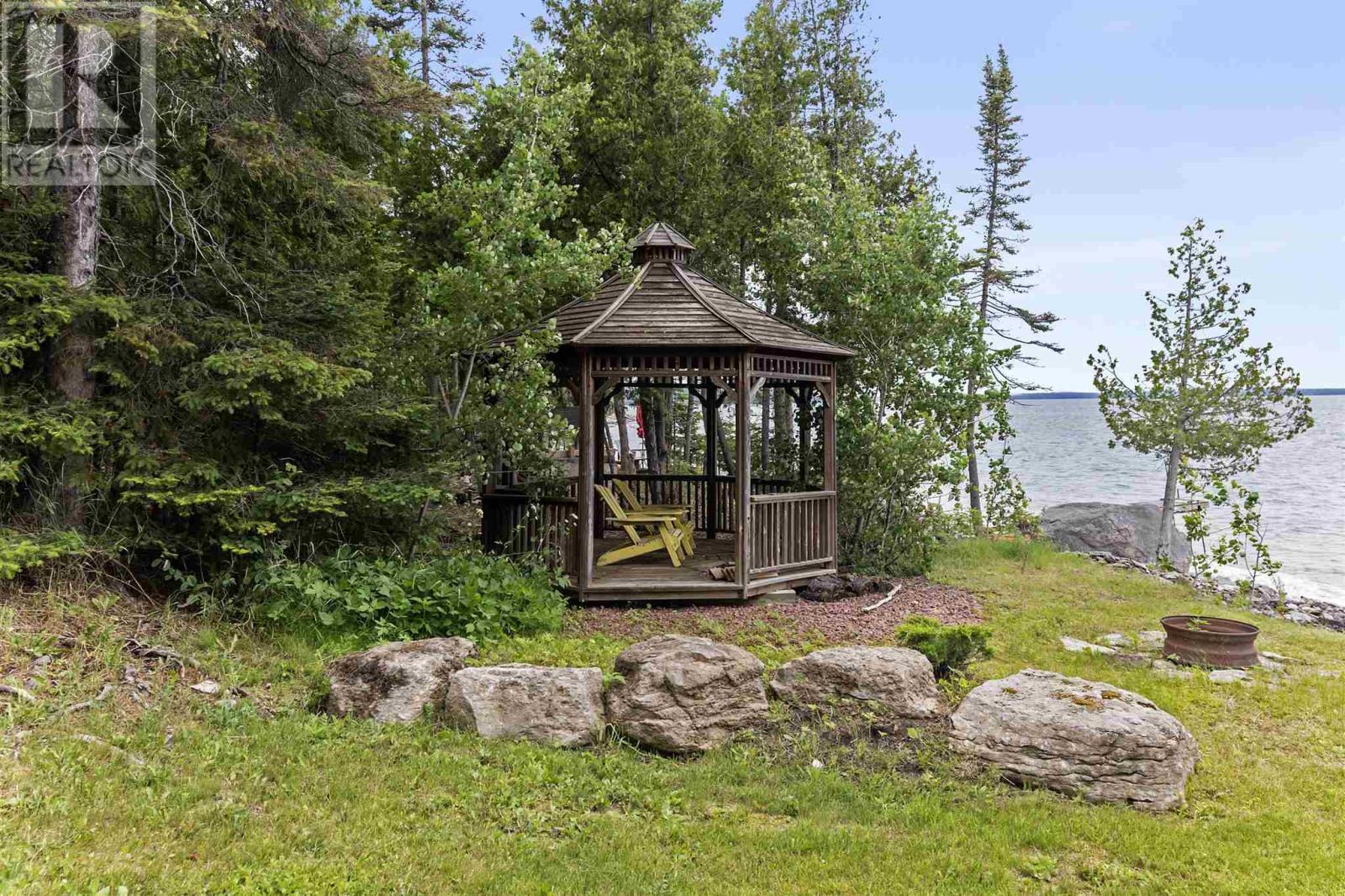 3804 Hamilton Dr, Hilton Beach, ON - Outdoor With Backyard