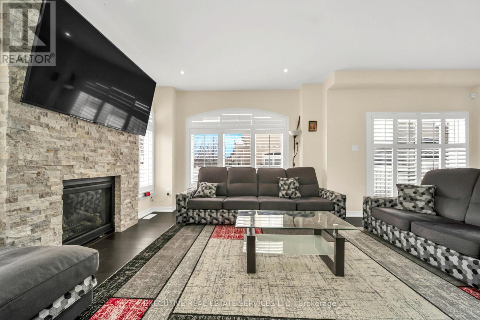 13 Masken Circle, Brampton, ON - Indoor Photo Showing Living Room With Fireplace