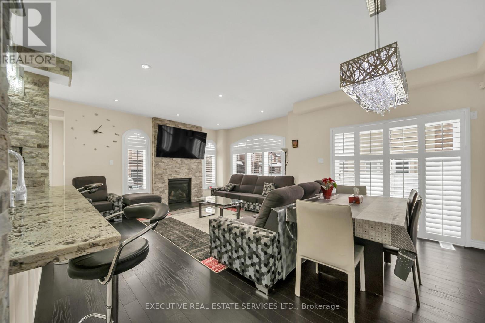 13 Masken Circle, Brampton, ON - Indoor Photo Showing Dining Room With Fireplace