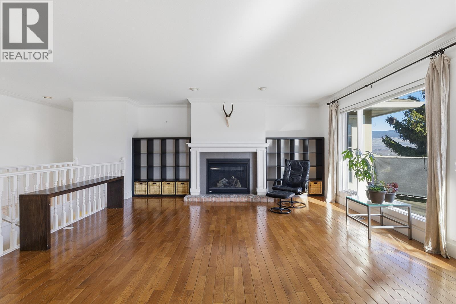 Living Room - 745 Cassiar Crescent, Kelowna, BC - Indoor Photo Showing Living Room With Fireplace