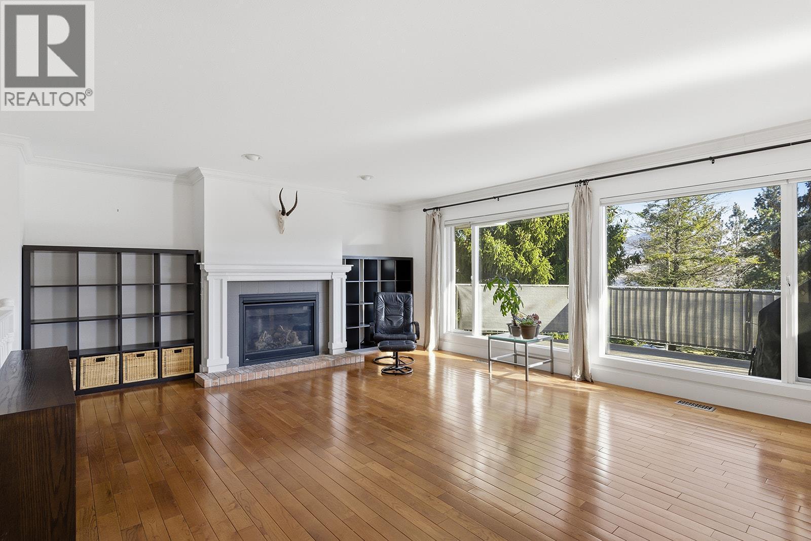 Living Room - 745 Cassiar Crescent, Kelowna, BC - Indoor Photo Showing Living Room With Fireplace