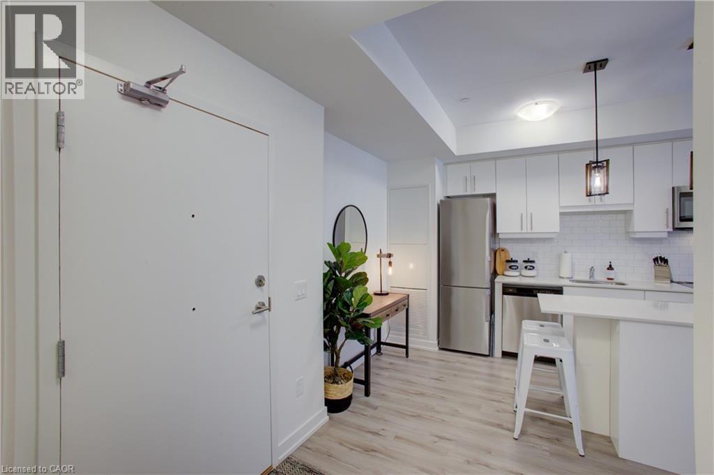 243 Northfield Drive E Unit# 208, Waterloo, ON - Indoor Photo Showing Kitchen With Stainless Steel Kitchen