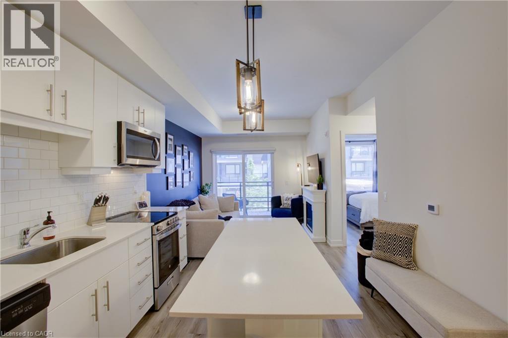 243 Northfield Drive E Unit# 208, Waterloo, ON - Indoor Photo Showing Kitchen With Stainless Steel Kitchen With Upgraded Kitchen