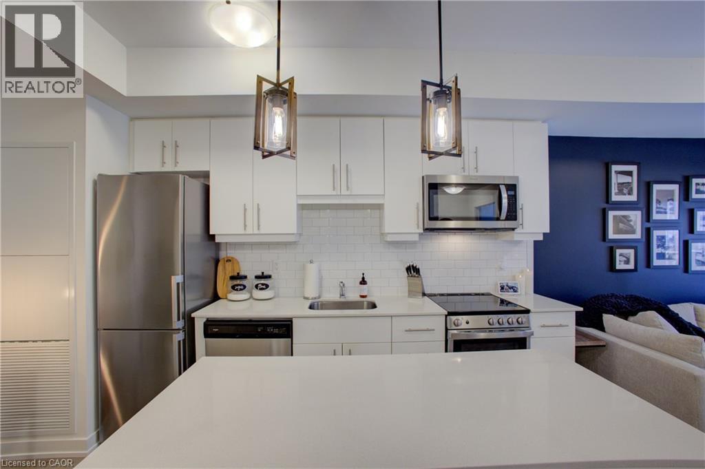 243 Northfield Drive E Unit# 208, Waterloo, ON - Indoor Photo Showing Kitchen With Stainless Steel Kitchen With Upgraded Kitchen