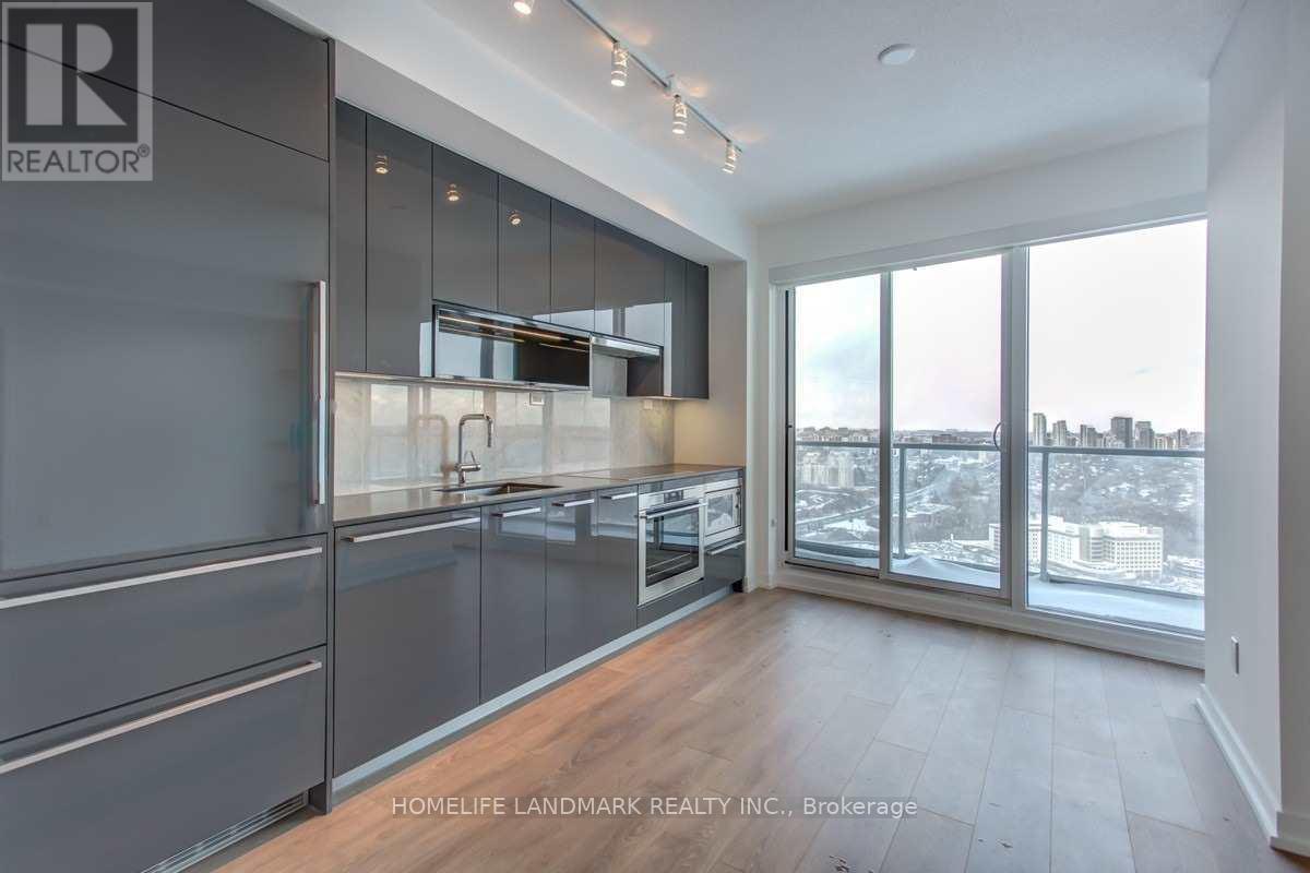 2011 - 117 Mcmahon Drive, Toronto, ON - Indoor Photo Showing Kitchen With Upgraded Kitchen