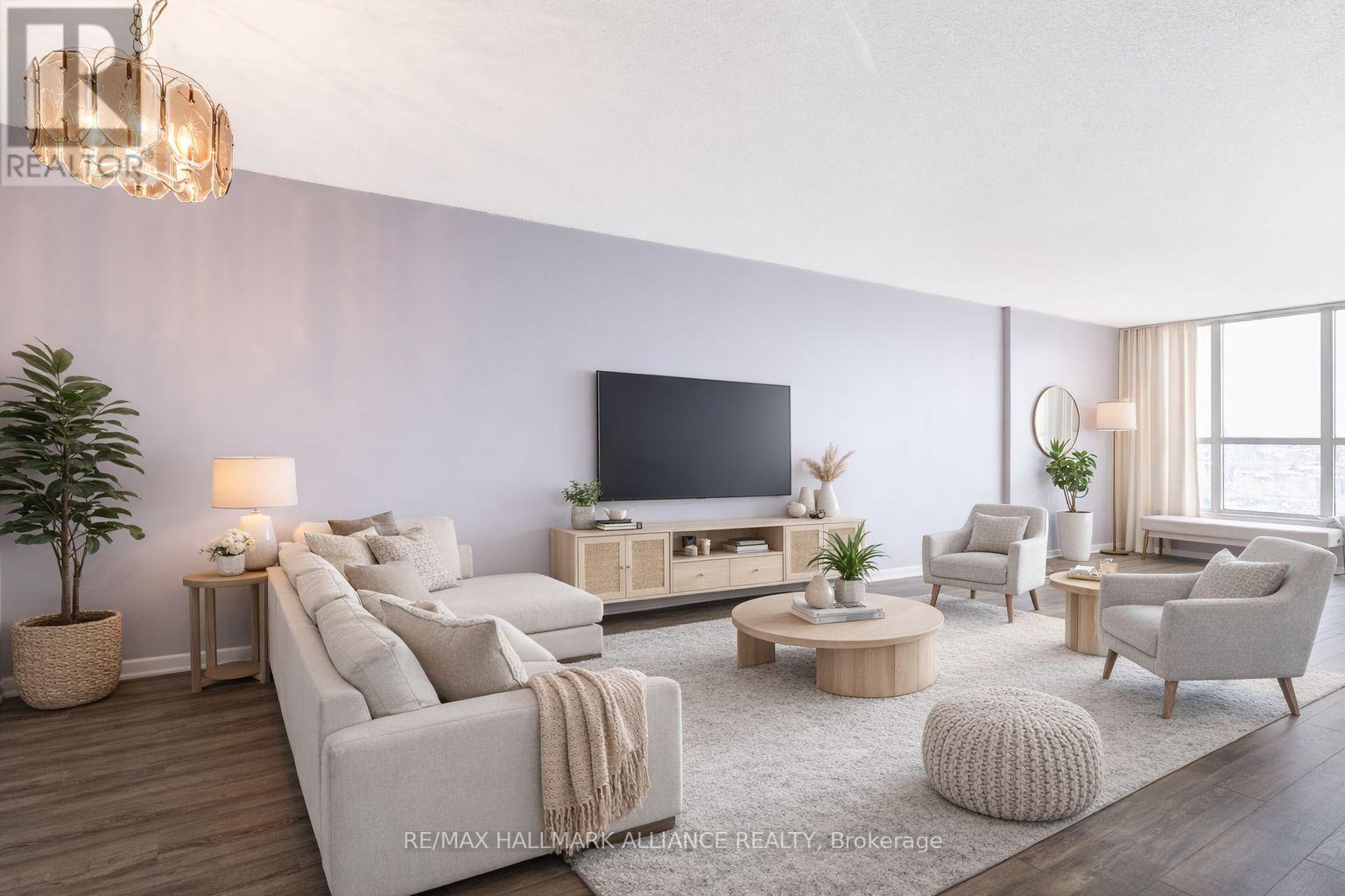 Virtually staged for illustrative purposes - 707 - 3 Rowntree Road, Toronto, ON - Indoor Photo Showing Living Room