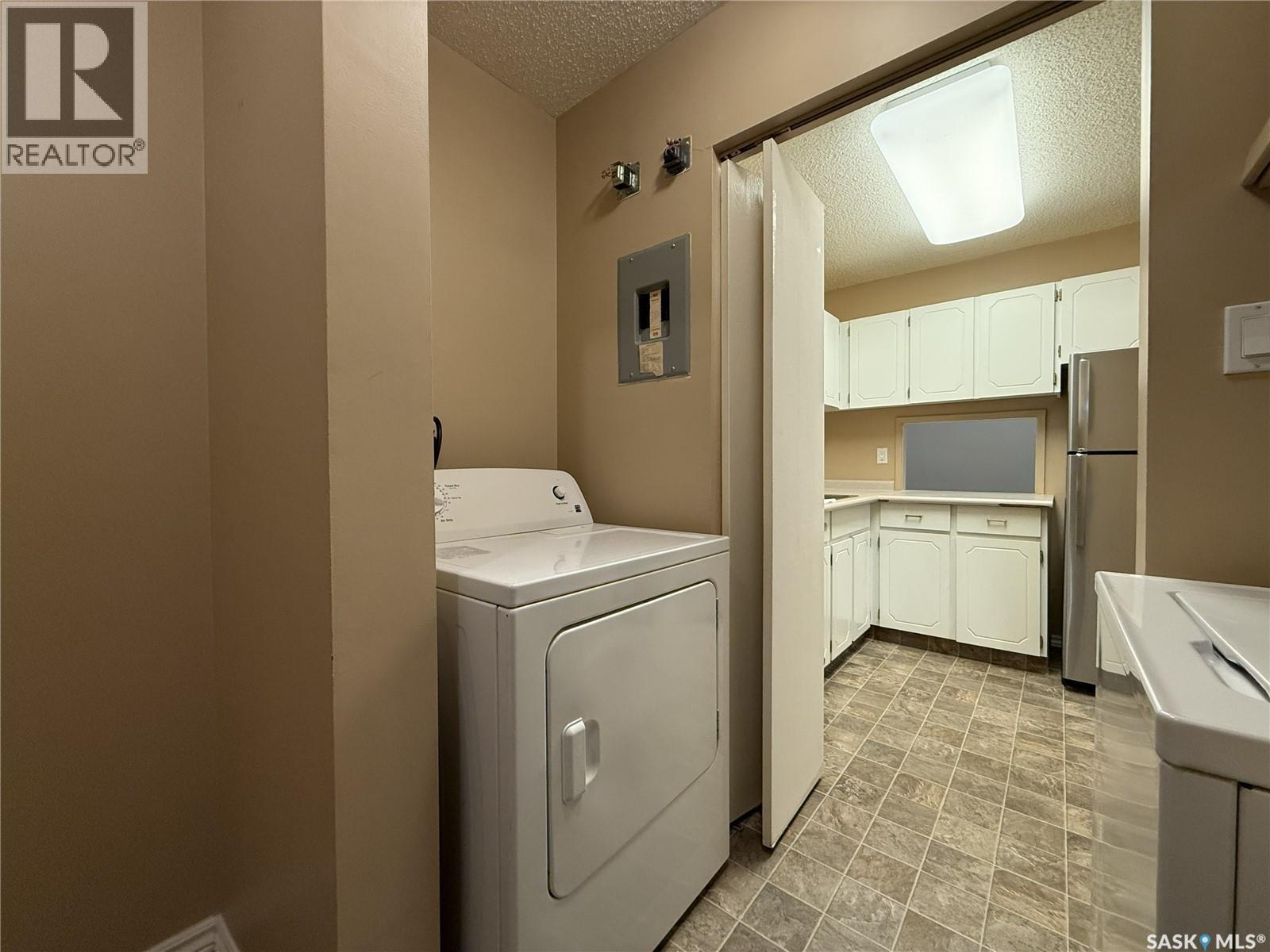 B 64 Nollet Avenue, Regina, SK - Indoor Photo Showing Laundry Room