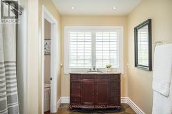 Main Bath with Semi Ensuite Access to Bedroom 2 -