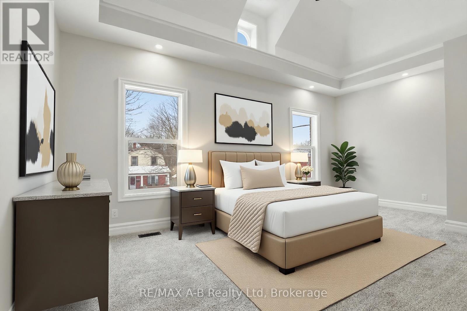 This image has been virtually staged - 307 Nelson Street, Stratford, ON - Indoor Photo Showing Bedroom