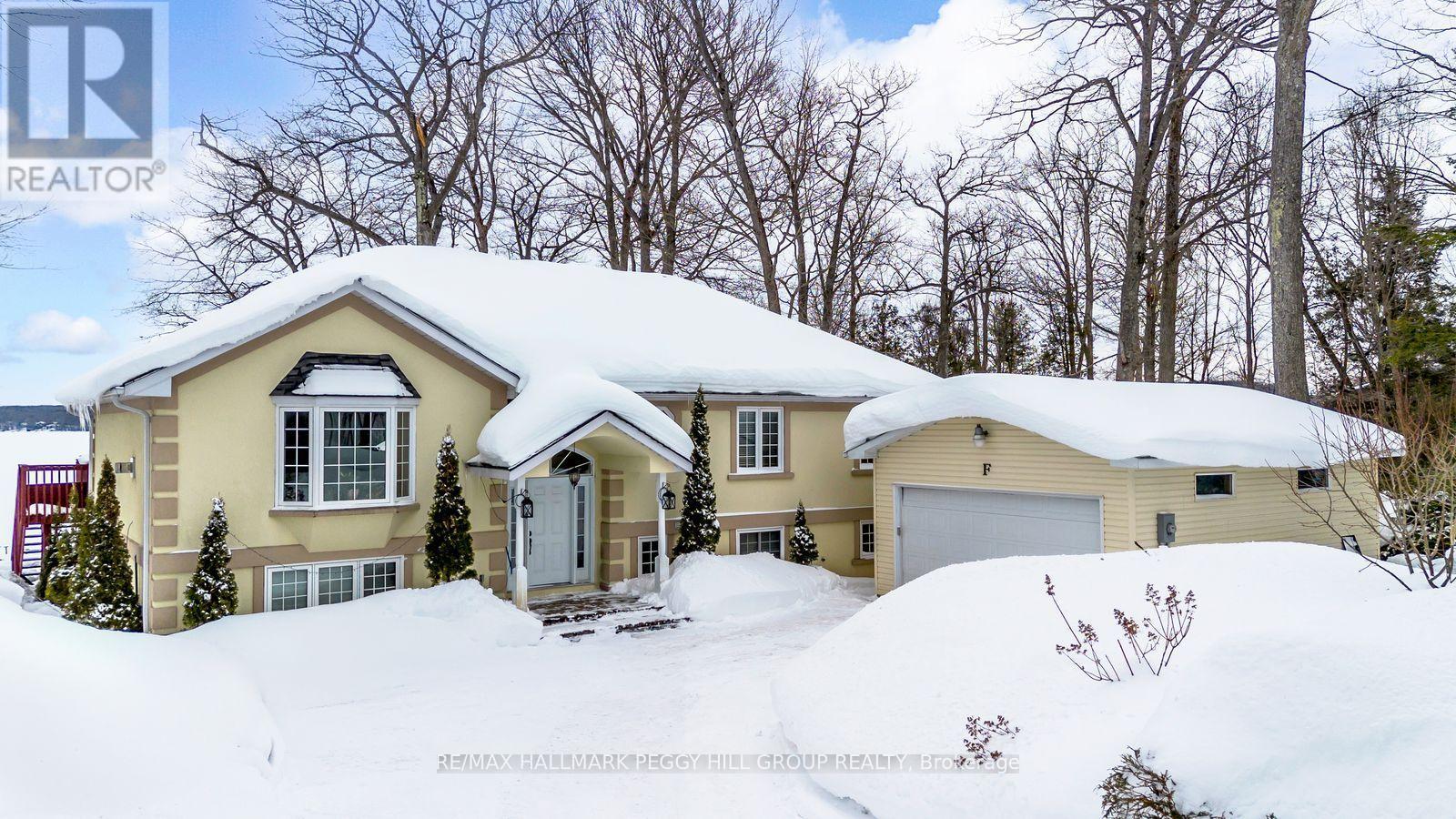 383 Peek-A-Boo Trail, Tiny, ON - Outdoor With Facade