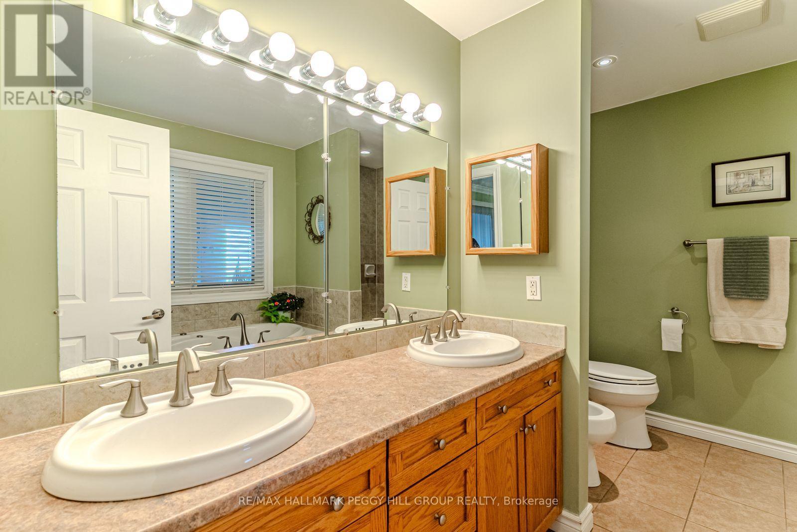 383 Peek-A-Boo Trail, Tiny, ON - Indoor Photo Showing Bathroom