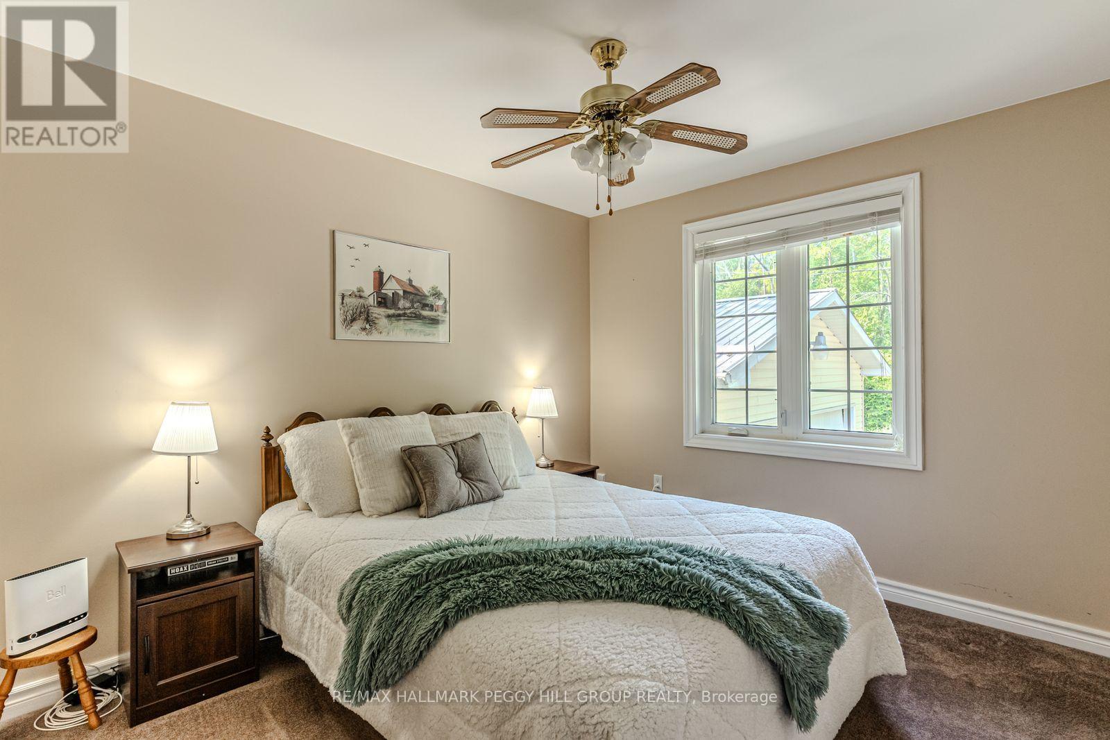 383 Peek-A-Boo Trail, Tiny, ON - Indoor Photo Showing Bedroom