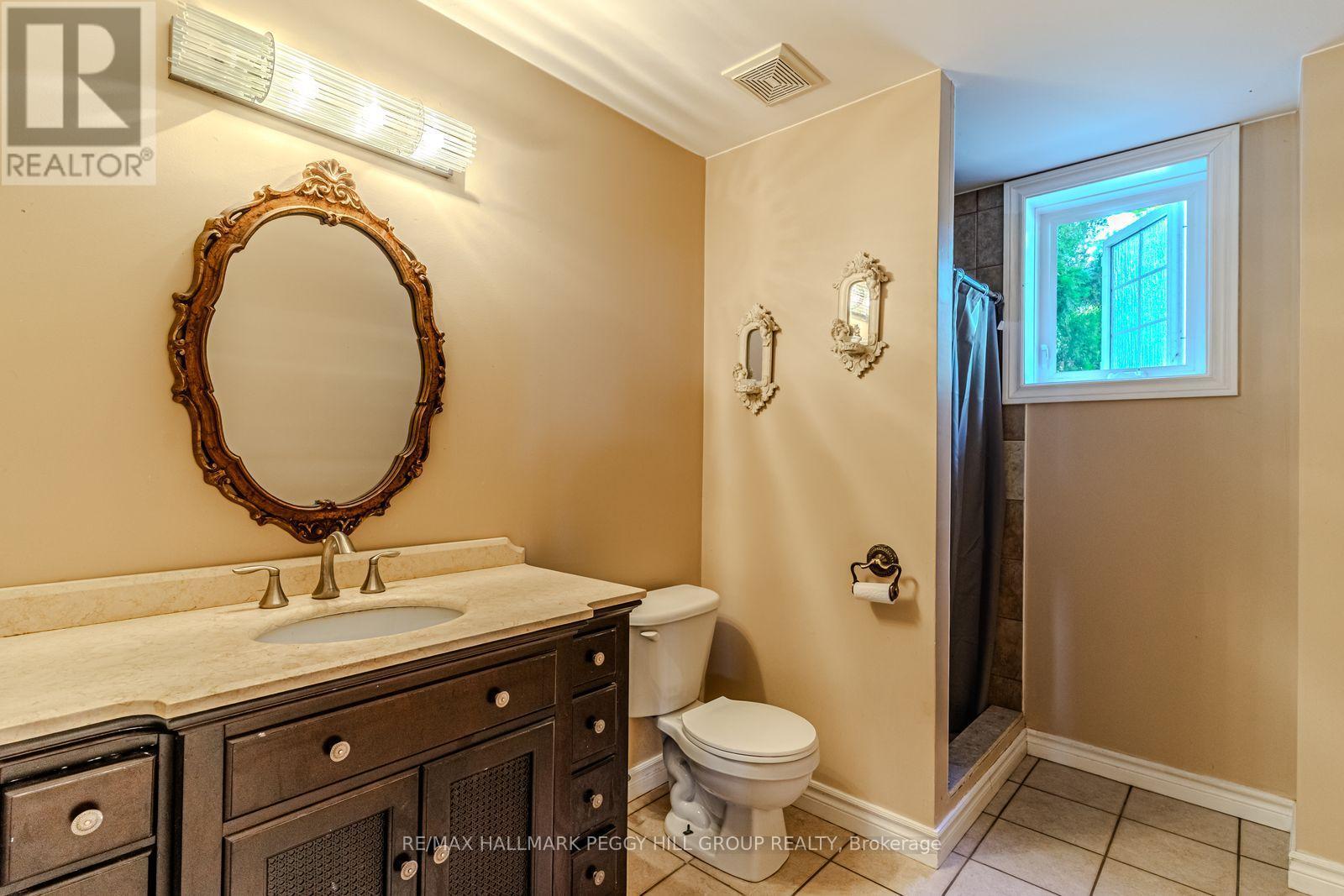 383 Peek-A-Boo Trail, Tiny, ON - Indoor Photo Showing Bathroom