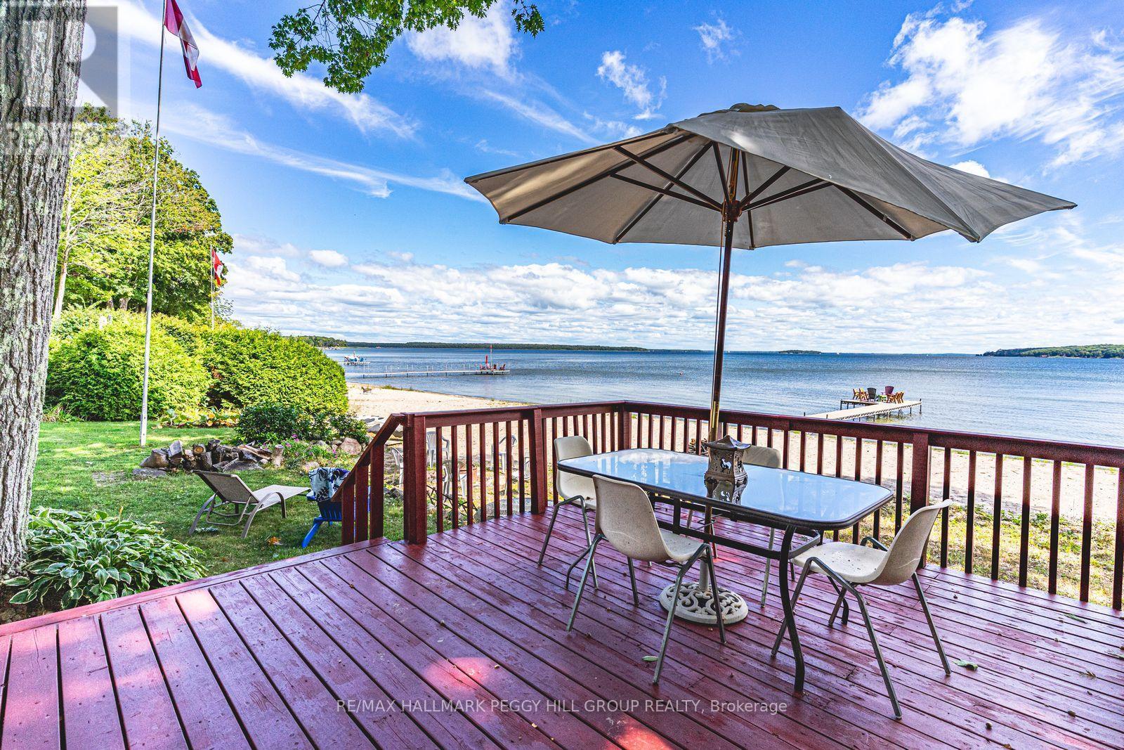 383 Peek-A-Boo Trail, Tiny, ON - Outdoor With Body Of Water With Deck Patio Veranda With View With Exterior