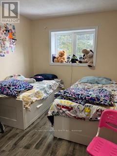 7 Sandhurst Circle E, Toronto, ON - Indoor Photo Showing Bedroom